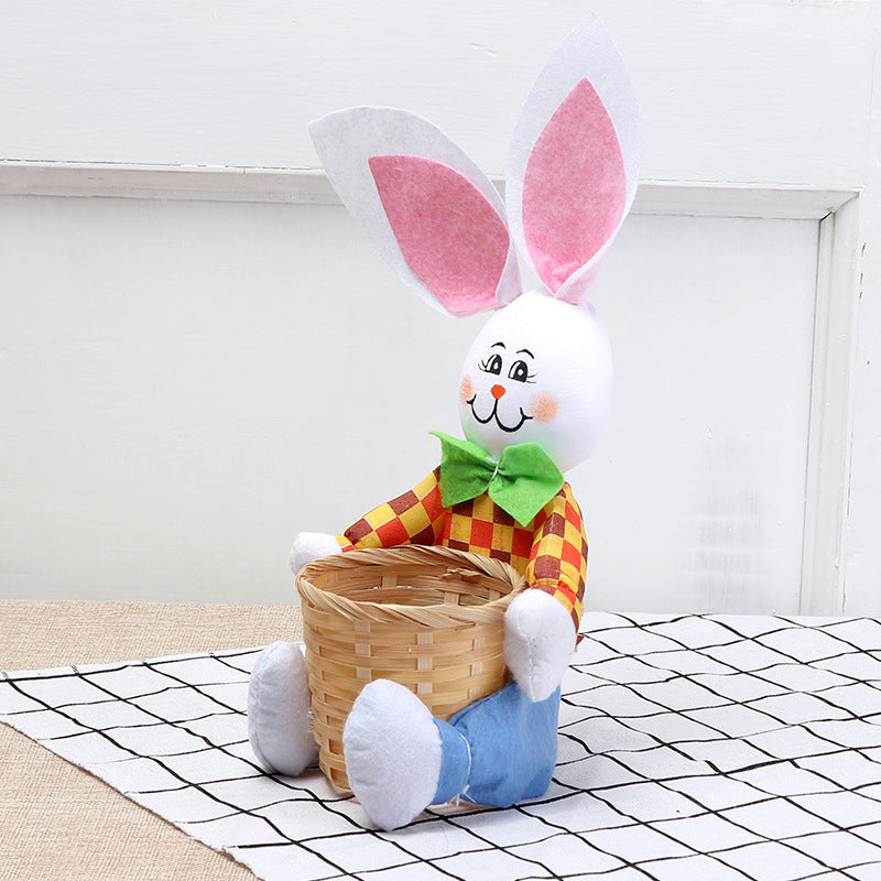 Plush toy rabbit with bunny ears and a basket on a checkered floor.